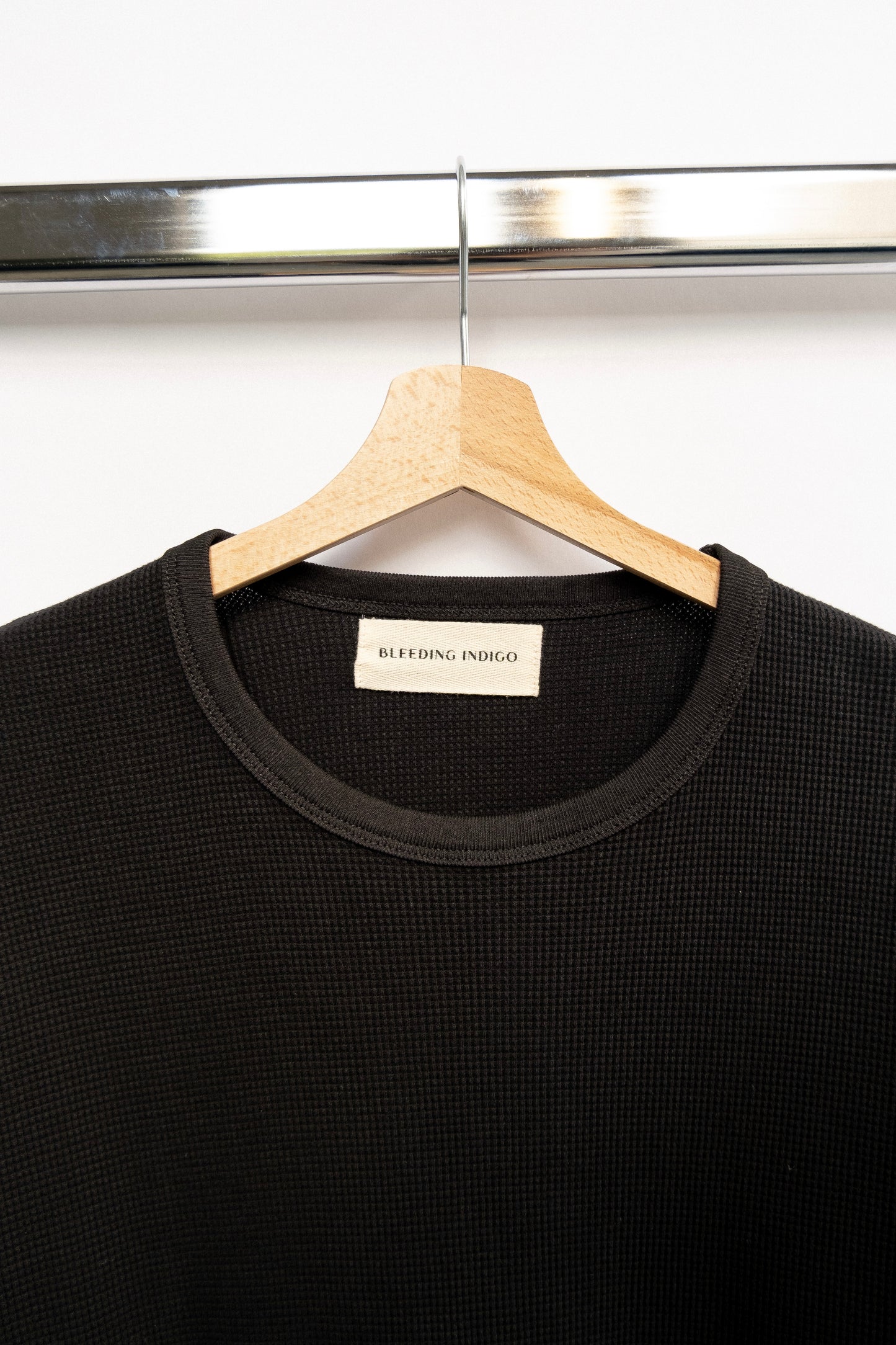 
                  
                    WAFFLE KNIT T-SHIRT BLACK
                  
                