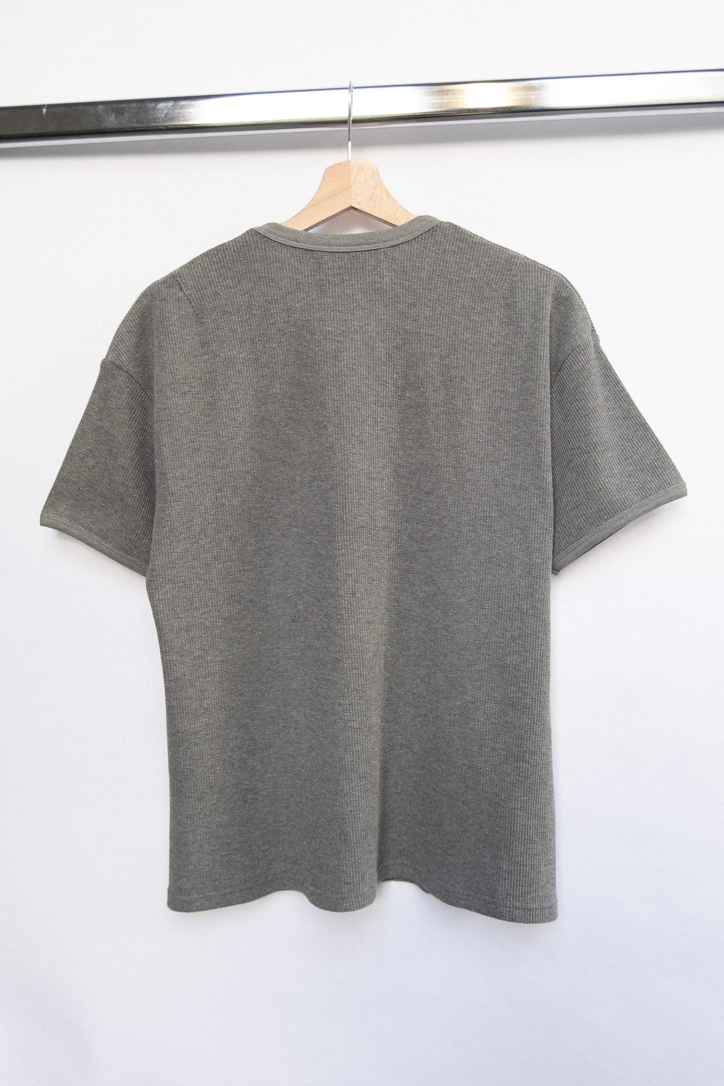
                  
                    WAFFLE KNIT T-SHIRT GREY
                  
                
