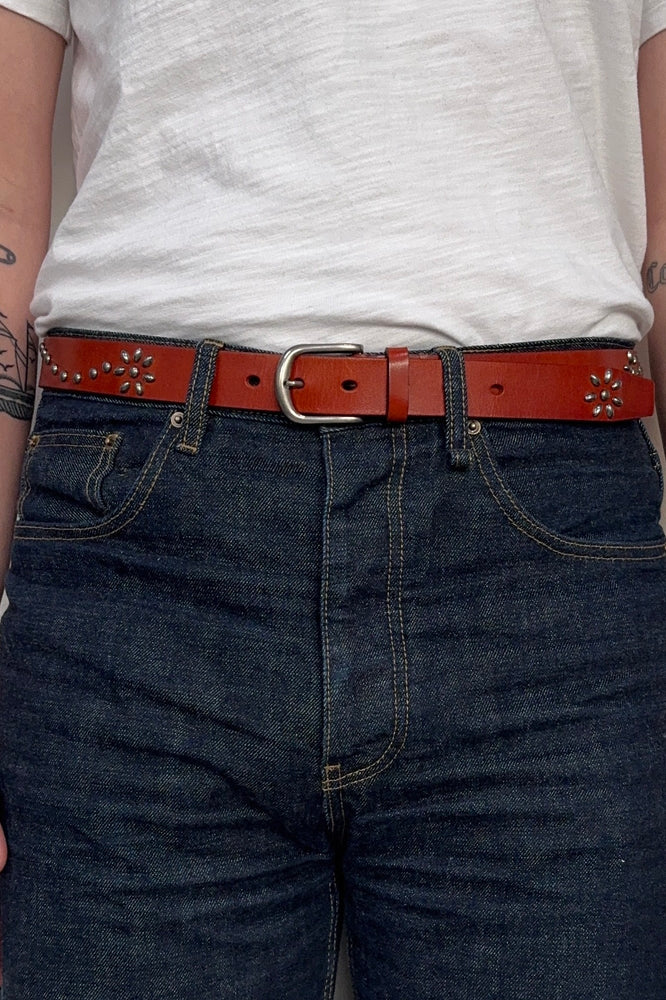 
                  
                    STUDDED BELT COGNAC
                  
                