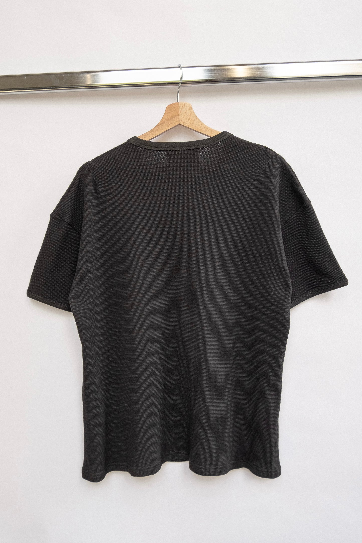 
                  
                    WAFFLE KNIT T-SHIRT BLACK
                  
                