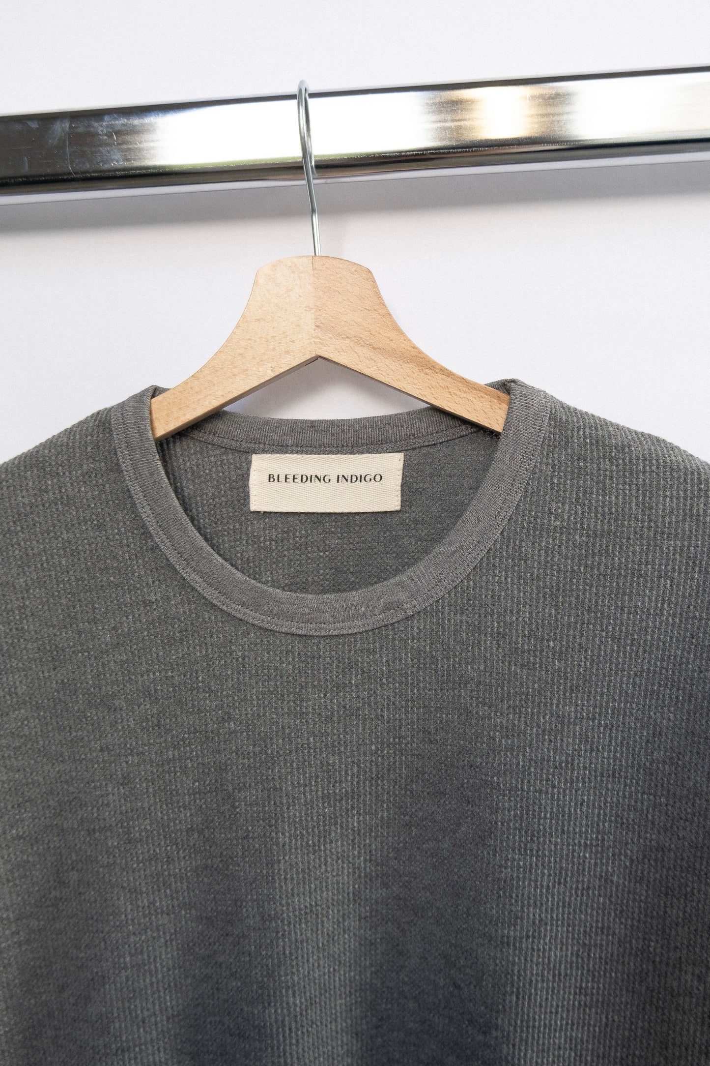 
                  
                    WAFFLE KNIT T-SHIRT GREY
                  
                