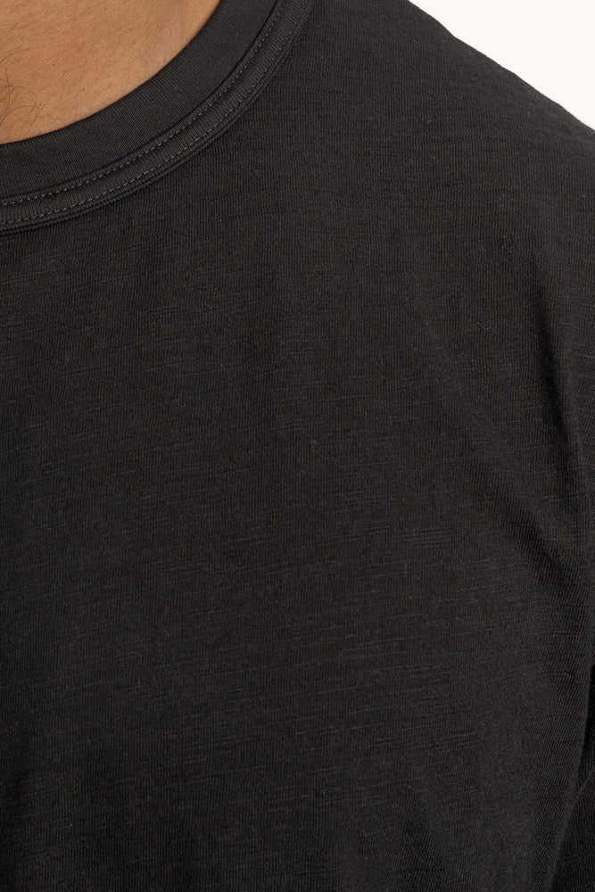 
                  
                    SLUB T-SHIRT BLACK
                  
                