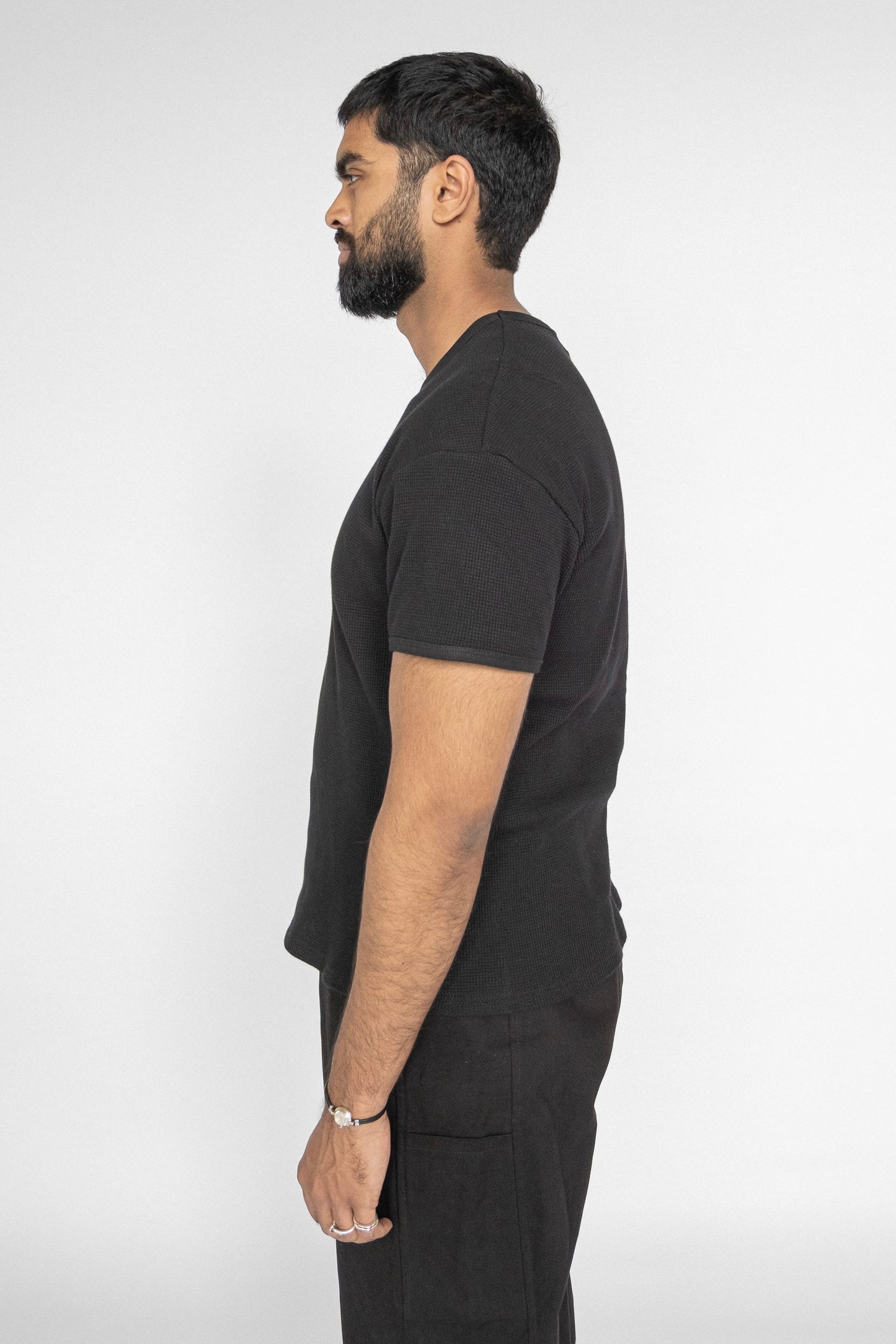 
                  
                    WAFFLE KNIT T-SHIRT BLACK
                  
                