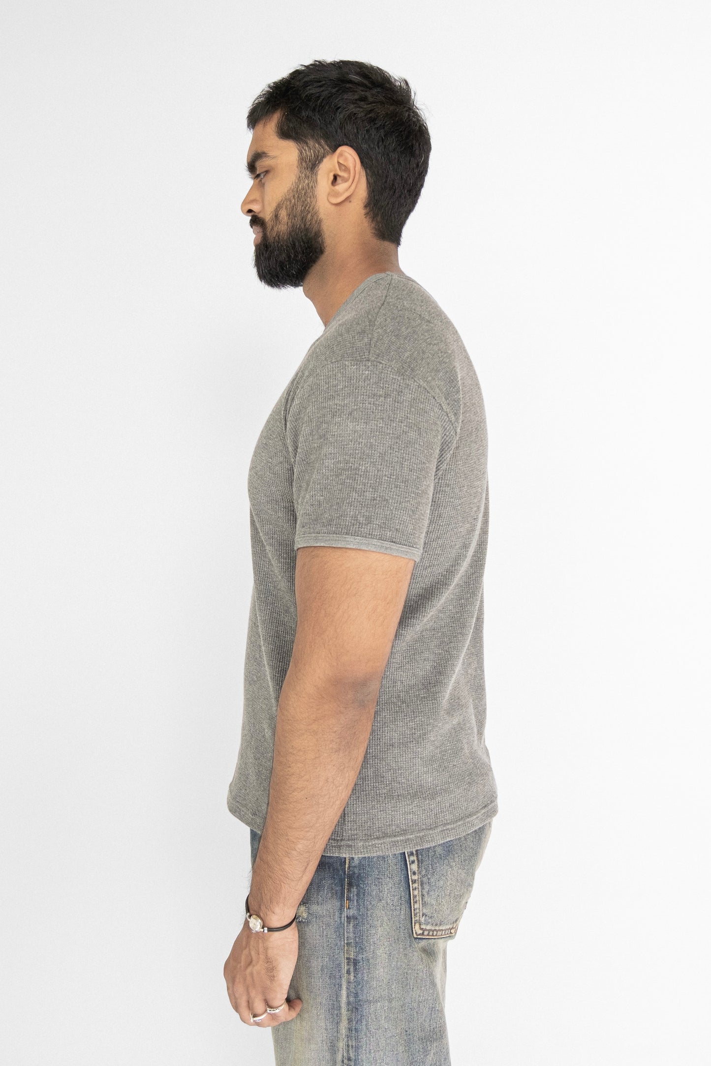 
                  
                    WAFFLE KNIT T-SHIRT GREY
                  
                