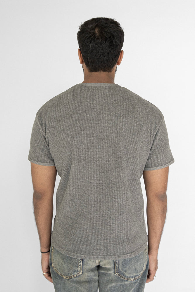 
                  
                    WAFFLE KNIT T-SHIRT GREY
                  
                